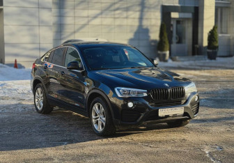 Подержанный автомобиль BMW X4 2015 года (3 фото)