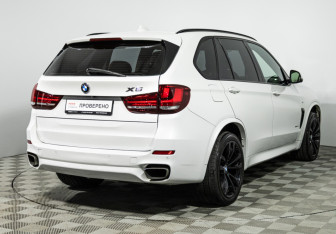 Подержанный автомобиль BMW X5 2015 года (5 фото)
