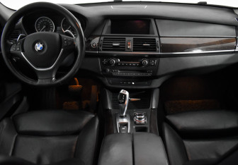 Подержанный автомобиль BMW X6 2013 года (20 фото)