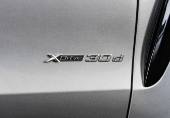 Подержанный автомобиль BMW X6 2018 года (11 фото)