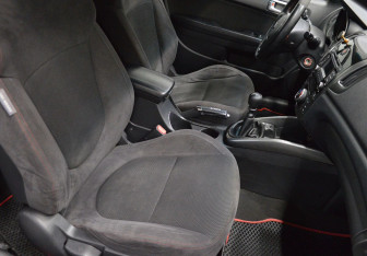 Подержанный автомобиль Kia Cerato Coupe 2010 года (12 фото)