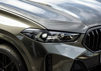 Подержанный автомобиль BMW X6 2023 года (12 фото)