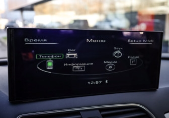 Подержанный автомобиль Audi Q3 2014 года (15 фото)