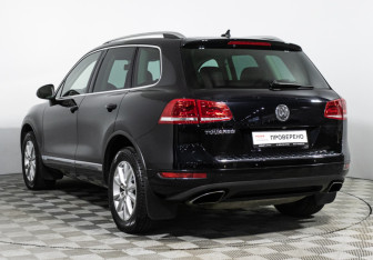 Подержанный автомобиль Volkswagen Touareg 2014 года (7 фото)