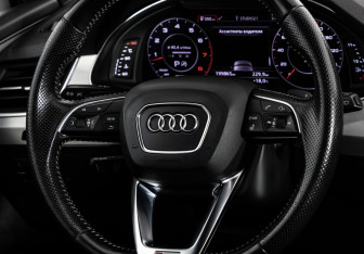 Подержанный автомобиль Audi Q7 2015 года (12 фото)