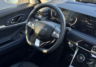 Подержанный автомобиль Exeed TXL 2023 года (10 фото)