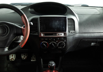 Подержанный автомобиль Geely MK Cross 2013 года (14 фото)