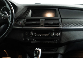 Подержанный автомобиль BMW X6 2014 года (14 фото)