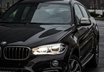 Подержанный автомобиль BMW X6 2016 года (2 фото)