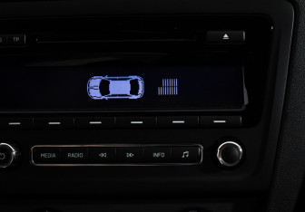 Подержанный автомобиль Skoda Rapid Liftback 2014 года (16 фото)