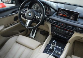 Подержанный автомобиль BMW X6 2017 года (12 фото)