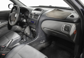 Подержанный автомобиль Nissan Almera Classic 2010 года (12 фото)