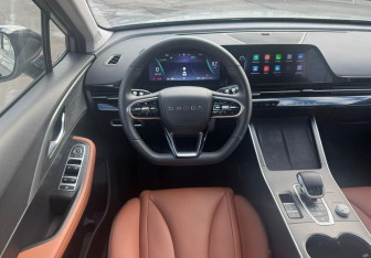 Подержанный автомобиль Omoda C5 2023 года (10 фото)