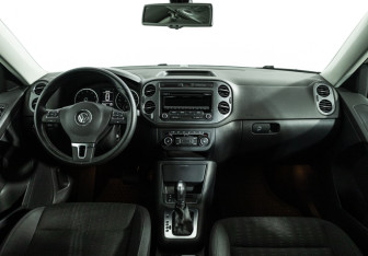 Подержанный автомобиль Volkswagen Tiguan 2014 года (13 фото)
