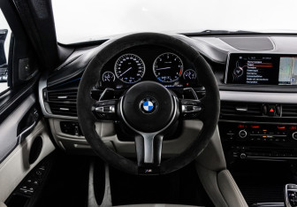 Подержанный автомобиль BMW X6 2015 года (16 фото)