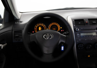 Подержанный автомобиль Toyota Corolla Sedan 2008 года (9 фото)