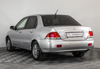 Подержанный автомобиль Mitsubishi Lancer Sedan 2006 года (7 фото)
