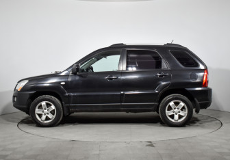 Подержанный автомобиль Kia Sportage 2009 года (8 фото)