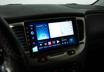 Подержанный автомобиль Kia Rio Hatchback 2009 года (15 фото)