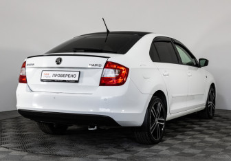 Подержанный автомобиль Skoda Rapid Liftback 2015 года (5 фото)