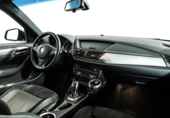 Подержанный автомобиль BMW X1 2014 года (9 фото)