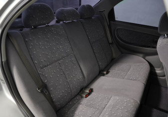 Подержанный автомобиль Kia Spectra Sedan 2009 года (10 фото)