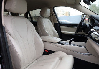 Подержанный автомобиль BMW X6 2016 года (11 фото)