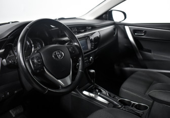 Подержанный автомобиль Toyota Corolla Sedan 2014 года (9 фото)