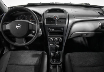 Подержанный автомобиль Nissan Almera Classic 2008 года (15 фото)