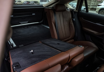 Подержанный автомобиль BMW X6 2015 года (26 фото)