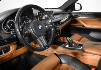 Подержанный автомобиль BMW X6 2014 года (9 фото)