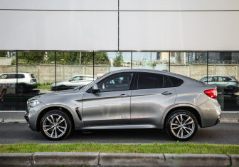 Подержанный автомобиль BMW X6 2017 года (9 фото)