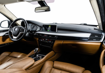 Подержанный автомобиль BMW X6 2015 года (9 фото)