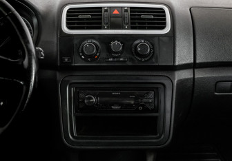 Подержанный автомобиль Skoda Fabia Hatchback 2009 года (11 фото)