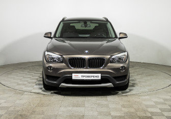 Подержанный автомобиль BMW X1 2013 года (2 фото)