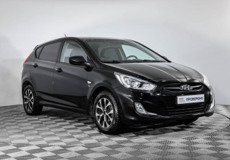 Подержанный автомобиль Hyundai Solaris Hatchback 2012 года (3 фото)