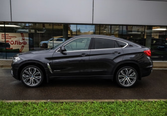 Подержанный автомобиль BMW X6 2016 года (7 фото)