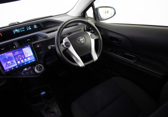 Подержанный автомобиль Toyota Aqua 2017 года (10 фото)