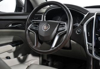 Подержанный автомобиль Cadillac SRX 2014 года (15 фото)