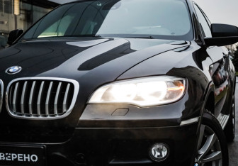 Подержанный автомобиль BMW X6 2013 года (2 фото)