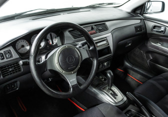 Подержанный автомобиль Mitsubishi Lancer Sedan 2006 года (11 фото)