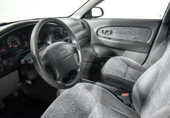 Подержанный автомобиль Kia Spectra Sedan 2007 года (9 фото)