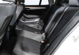 Подержанный автомобиль BMW X1 2013 года (10 фото)