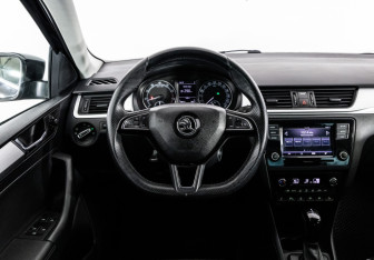 Подержанный автомобиль Skoda Rapid Liftback 2019 года (14 фото)