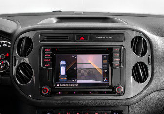 Подержанный автомобиль Volkswagen Tiguan 2015 года (18 фото)