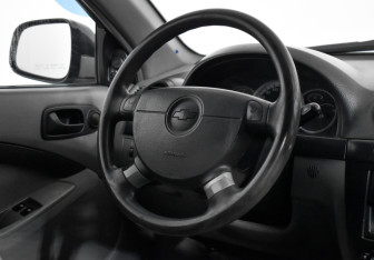 Подержанный автомобиль Chevrolet Lacetti Wagon 2010 года (15 фото)