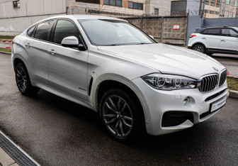 Подержанный автомобиль BMW X6 2018 года (3 фото)