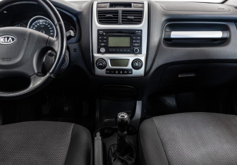 Подержанный автомобиль Kia Sportage 2009 года (11 фото)