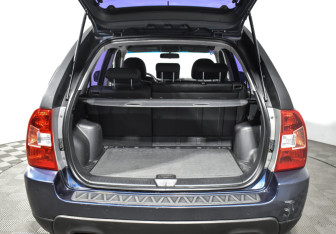 Подержанный автомобиль Kia Sportage 2009 года (18 фото)