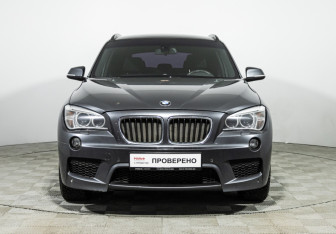 Подержанный автомобиль BMW X1 2014 года (2 фото)